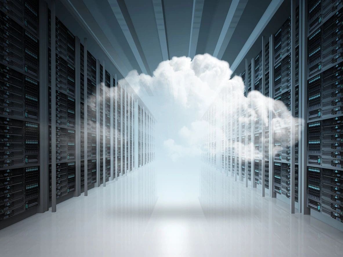 A cloud formation appears at the center of a server room, symbolizing cloud computing or cloud data storage amidst rows of server racks.